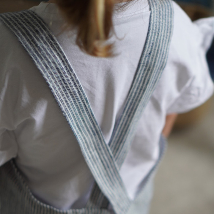 Lotta children's apron (navy blue stripes) - with braces
